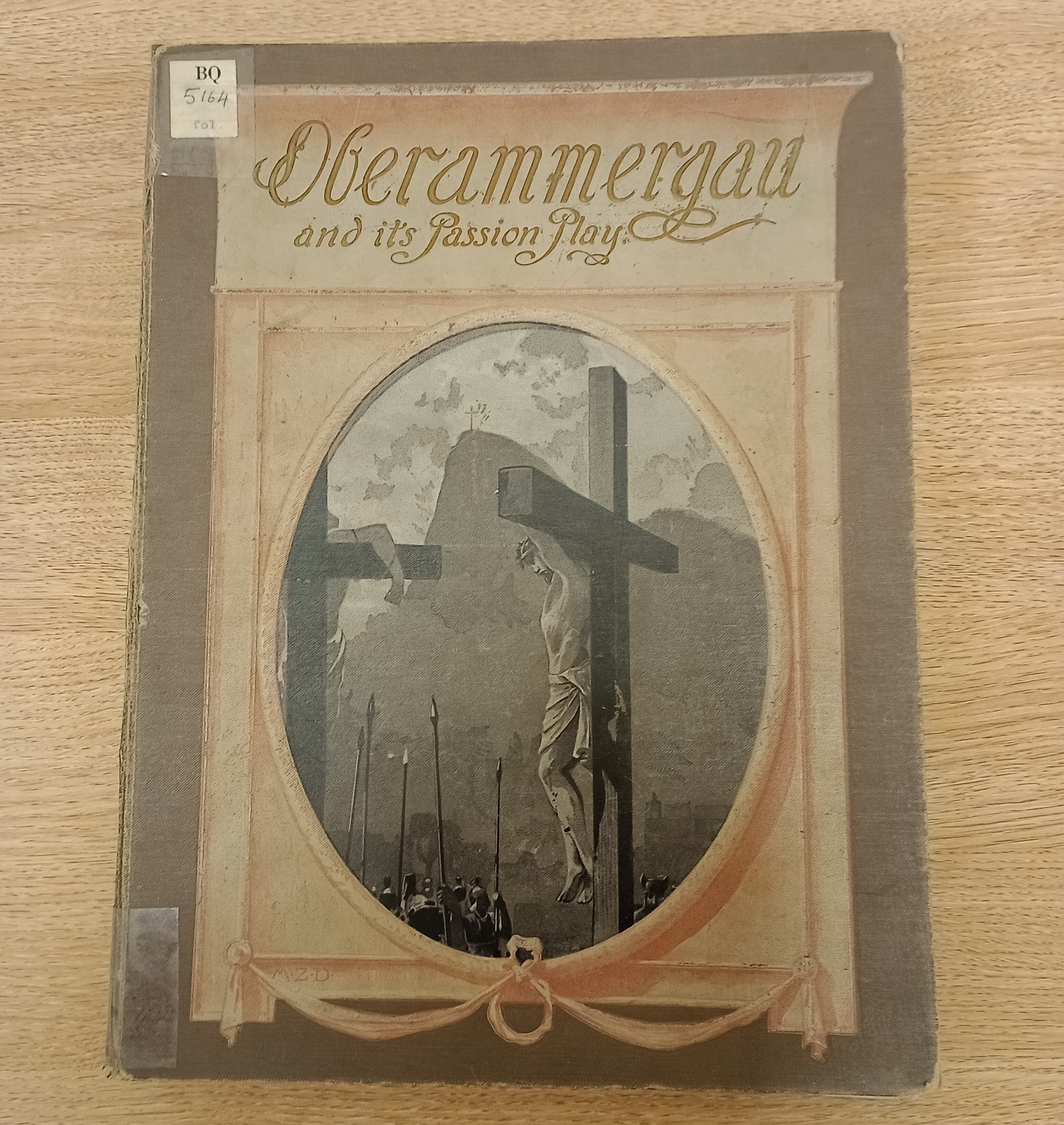 Cover shows a glimpse of a crucifixion scene. with Jesus in the front, and a mountainside with a Cross in the background.