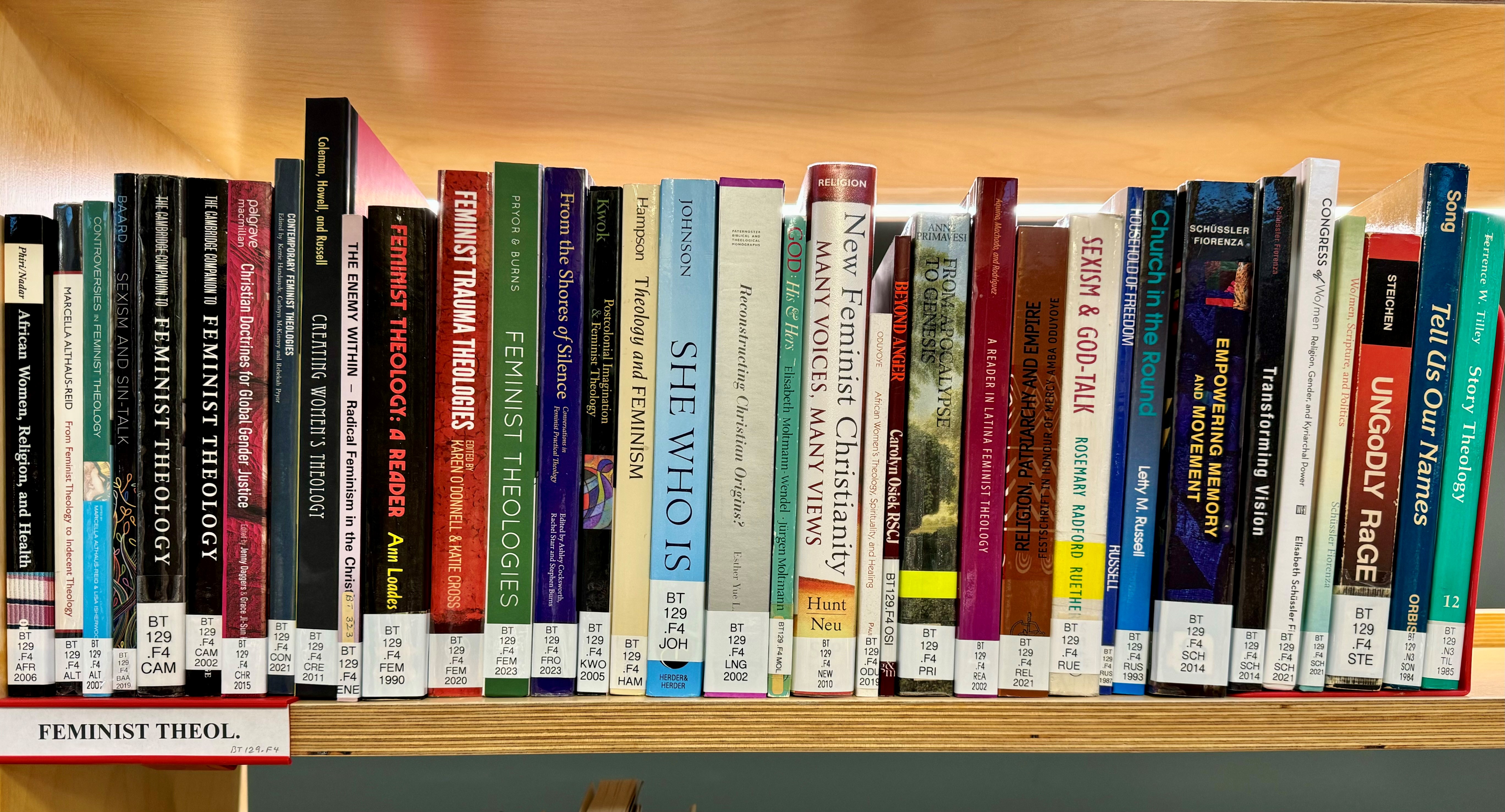 Feminist Theology books on a shelf.