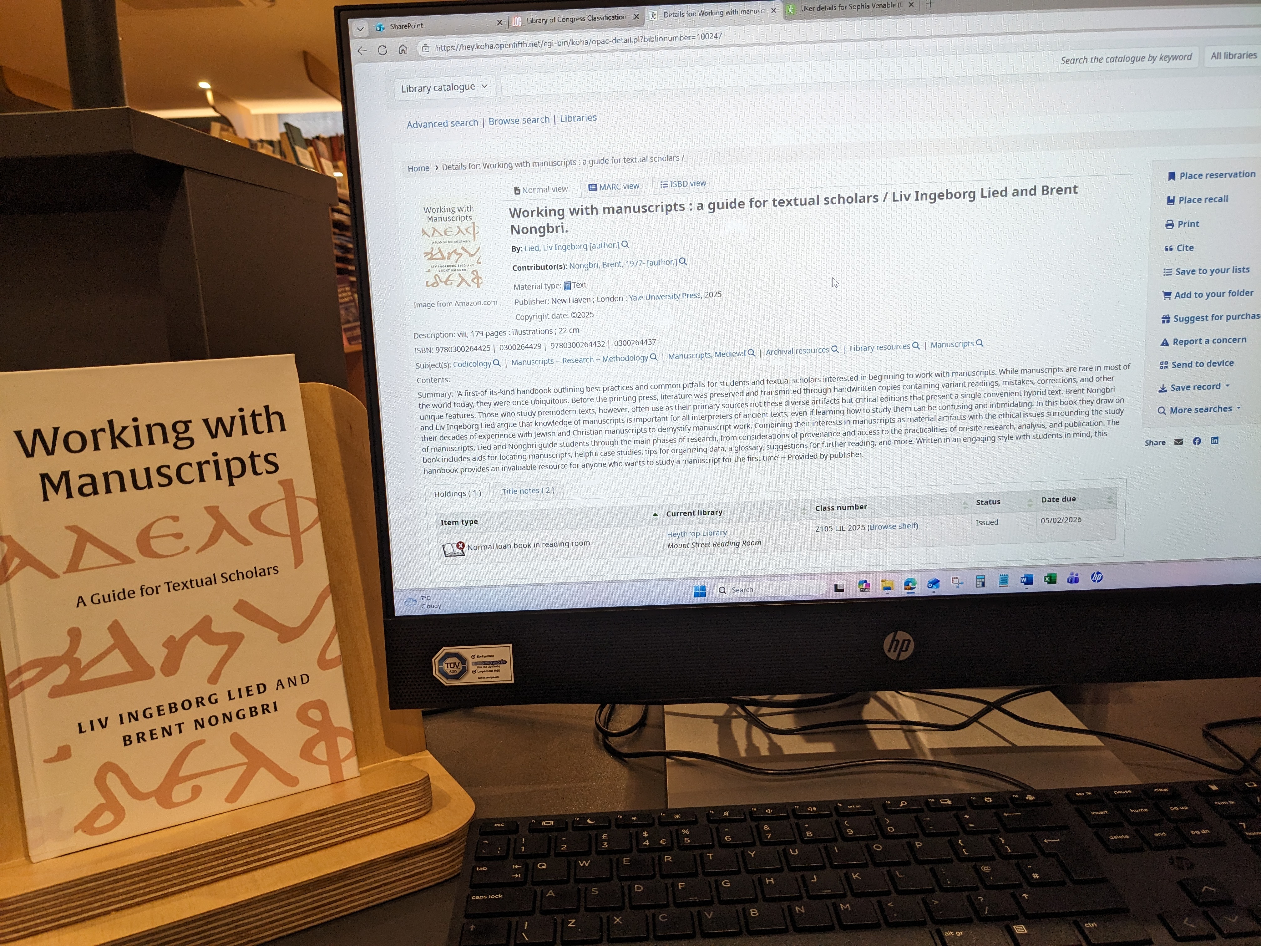 The book 'Working with manuscripts' and its catalogue record on the OPAC.